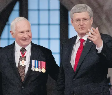  ?? CANADIAN PRESS FILES ?? Gov. Gen. David Johnston, left, pictured with Prime Minister Stephen Harper in October 2013, could be in line for a tough decision if the next federal election result is as tight as anticipate­d and he has to call on a leader to form a government.