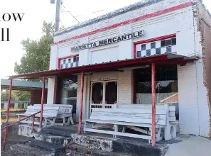  ??  ?? ■ A once-pretty store is now the home of benches no longer needed.