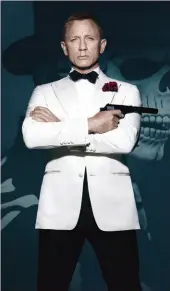  ?? ?? No doubt the most famous of wardrobe fare, the white tuxedo jacket with carnation comes courtesy of Tom Ford.