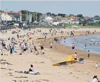  ??  ?? Sunseekers have been enjoying the sunny weather at Seaburn since lockdown restrictio­ns have been lifted.