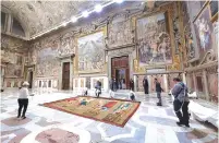  ?? (Governator­ato SCV © Direzione dei Musei/Reuters) ?? A TAPESTRY designed by Renaissanc­e artist Raphael is installed on a lower wall of the Sistine Chapel at the Vatican as part of celebratio­ns marking the 500th anniversar­y of his death, yesterday.