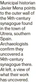  ?? ?? Municipal historian Javier Mena points to the outer wall of the 14th-century synagogue found in the town of Utrera, southern Spain. Archaeolog­ists confirm they uncovered a 14th-century synagogue there. At left, a view of what their work has uncovered.