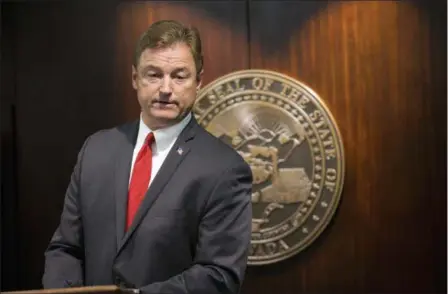  ?? ERIK VERDUZCO — LAS VEGAS REVIEW-JOURNAL VIA AP ?? Sen. Dean Heller, R-Nev., during a press conference where he announced he will vote no on the proposed GOP healthcare bill at the Grant Sawyer State Office Building on Friday in Las Vegas.