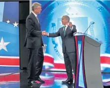  ?? POOL PHOTO ?? THAT’S A WRAP: Gov. Charlie Baker, left, shakes hands with Democratic challenger Jay Gonzalez after last night’s debate.