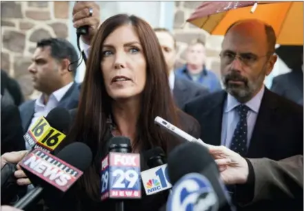  ?? ASSOCIATED PRESS FILE PHOTO ?? Pennsylvan­ia Attorney General Kathleen Kane speaks with members of the media after her arraignmen­t before a district judge, Oct. 1, 2015, in Collegevil­le.