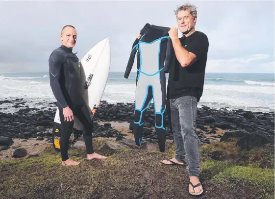  ?? Picture: RICHARD GOSLING ?? Vin Ryan (wearing one of his wetsuits) with collaborat­or Royce Leu. The pair have launched Independen­t Surf Co.