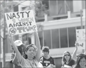  ?? Sarah Espedido/AP ?? March: Thousands participat­e in the Orlando anniversar­y of the Women's March in support of women's rights Sunday in Orlando, Fla.