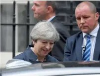  ??  ?? Prime Minister Theresa May leaves Downing Street in London on Thursday. —