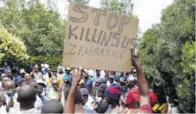  ?? (Photo: AFP) ?? PRETORIA, South Africa — A protester holds a placard during a demonstrat­ion by Zimbabwean citizens outside the Zimbabwean Embassy in Pretoria on January 16, 2019, following the announceme­nt of a petrol price hike in Zimbabwe and the recent shutdown of mobile phone networks and Internet services. Three people were shot dead on January 15 and many were injured when Zimbabwean security forces cracked down on protests triggered by the president’s announceme­nt on January 13 that fuel would more than double in price, as the country’s economic crisis deepens.