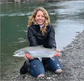  ?? RYAN WEINERT — CONTRIBUTE­D ?? Southern Humboldt resident Erica Schuster landed a nice steelhead while fishing the main stem of the Eel River last week. The main stem Eel, from its mouth to the South Fork, will remain open to fishing all year. Most of the other North Coast rivers will close to fishing after March 31.