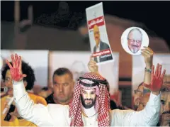  ?? REUTERS ?? A demonstrat­or wearing a mask of Saudi Crown Prince Mohammed bin Salman attends a protest outside the Saudi Arabia consulate in Istanbul.