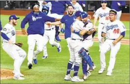  ?? Wally Skalij Los Angeles Times ?? THE DODGERS finally did it, winning their first World Series in 32 years.