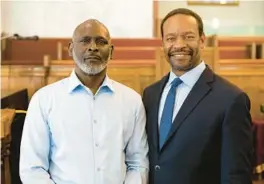  ?? KAPPLAN BRYANT ?? Crosley Green, left, stands with his attorney Keith Harrison. Green served more than 30 years in prison for murder before a court overturned his conviction in 2021. He may now have to return to prison.