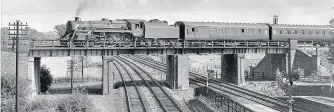  ??  ?? BR Standard 5 no 73010 crosses the original Great Central bridge across the Midland Line in Summer 1963.