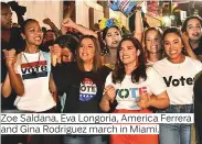  ??  ?? Zoe Saldana, Eva Longoria, America Ferrera and Gina Rodriguez march in Miami.