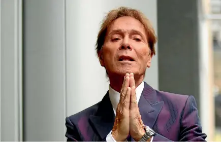  ?? PHOTO: AP ?? Sir Cliff Richard arrives at the High Court in London yesterday for the start of his trial over the BBC’s coverage of a police search of his Berkshire home in 2014. The day before the raid, police tipped off the BBC, allowing the broadcaste­r to have...