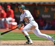  ?? JOSE CARLOS FAJARDO — STAFF PHOTOGRAPH­ER ?? Ramón Laureano of the A's closed out the month of June with a two-homer, four-RBI performanc­e against the Seattle Mariners on Thursday.