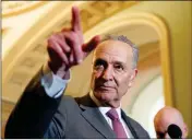  ?? ASSOCIATED PRESS ?? SENATE MINORITY LEADER CHUCK SCHUMER of N.Y. points to a question during a media availabili­ty after a policy luncheon on Capitol Hill in Washington on Tuesday.