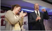  ?? CAROLYN KASTER — THE ASSOCIATED PRESS ?? State Sen. Doug Mastriano, R-Franklin, a Republican candidate for Pennsylvan­ia governor, gestures as he speaks at a primary night election gathering in Chambersbu­rg, Pa., Tuesday with his wife, Rebbeca.