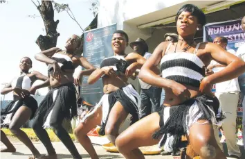  ?? — (Picture by Innocent Makawa) ?? Members of Baptism of Fire Traditiona­l Dance Group perform during the Hurungwe Arts Festival in Karoi on Saturday.