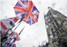  ?? MELVILLE ■ REUTERS ?? Union Jack flags are seen outside the Houses of Parliament in London, Britain, Oct. 24. TOBY