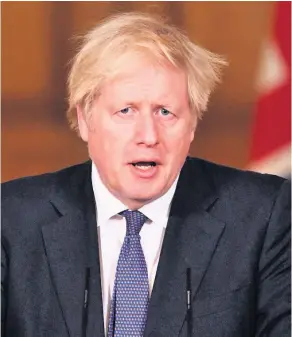  ??  ?? > UK Prime Minister Boris Johnson speaks during a media briefing. Q3