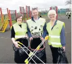  ??  ?? Happy to help Councillor Natalie Don, MSP Derek Mackay and Councillor Cathy McEwan