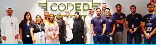  ??  ?? Group photo of Zain and Coded officials with young mentors.