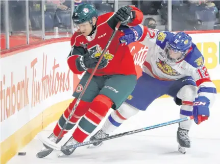  ?? TIM KROCHAK PHOTO ?? Halifax Mooseheads Lucas Robinson tries to keep the puck from Moncton Wildcats' Alexis Daniel during QMJHL action in Halifax on Oct. 29.