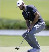  ?? — AFP ?? USA’s Dustin Johnson putts on the sixth green during the second round of the US Open in Southampto­n on Friday.
