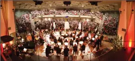  ??  ?? Grace Baptist Church’s orchestra plays Christmas songs for a packed crowd last week.