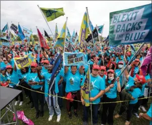  ?? The Associated Press ?? RALLY: Supporters of President Donald Trump rally at The White House where Trump held an event on the South lawn Saturday in Washington.