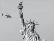  ?? Mark Lennihan / Associated Press ?? The Statue of Liberty in New York was a gift from France to America.