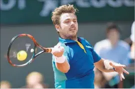  ?? Christophe Simon AFP/Getty Images ?? STAN WAWRINKA needed more than four hours to dispatch Andy Murray in the semifinals. He now faces Rafael Nadal, who is 9-0 in French Open finals.