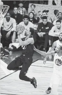  ?? ROBERT GAUTHIER LOS ANGELES TIMES ?? Toronto Raptors’ DeMar DeRozan, of Team Steph, gets by Kevin Durant, of Team LeBron, during second half action at the NBA all-star game Sunday in Los Angeles. Team LeBron won the contest, 148-143.