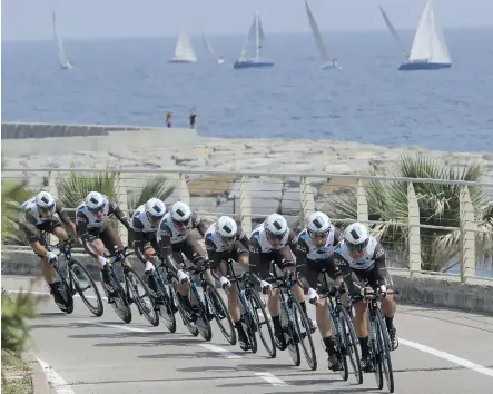  ?? LUK BENIES/ GETTY IMAGES ?? Cyclists compete in the Giro d’Italia road race. Although considered a major event on the world tour of cycling, it is overshadow­ed by the bigger and richer Tour de France and is now looking to regain some of its lustre.