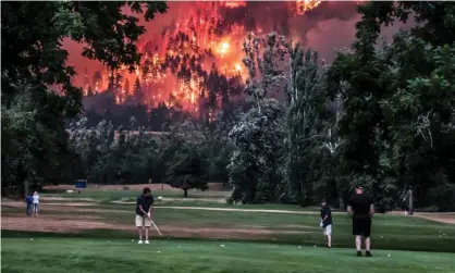  ??  ?? Eagle Creek wildfire, close to Beacon Rock golf course, Washington, US, in 2017: ‘We need to transform resilience to the full range of extreme risks we face. We don’t know what the next crisis will be.’ Photograph: Reuters