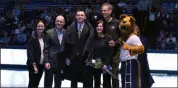  ?? COURTESY JON TRAMER ?? Jon Tramer, middle, is recognized during Penn State’s senior night in 2017. He was hired by the Pelicans as a video coordinato­r intern in June.