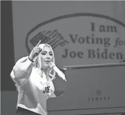  ?? ANDREW HARNIK/AP ?? In this Nov. 2 file photo, Lady Gaga performs during a drive-in rally for then Democratic presidenti­al candidate former Vice President Joe Biden at Heinz Field in Pittsburgh. Lady Gaga will sing the national anthem at Joe Biden’s presidenti­al inaugurati­on on the West Front of the U.S. Capitol when Biden is sworn in as the nation’s 46th president on Jan. 20.