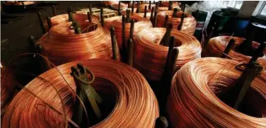  ?? Reuters ?? ↑
Copper rods are seen at Truong Phu cable factory in northern Hai Duong province, Vietnam.