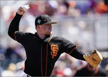  ?? PHOTOS BY ROSS D. FRANKLIN — THE ASSOCIATED PRESS ?? Giants pitcher Logan Webb, coming off an 11-3season, has struck out 10batters over five innings in two spring starts.