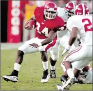  ?? AP file photo ?? Madre Hill rushed for 120 yards and 1 touchdown on 20 carries during Arkansas’ victory. The Razorbacks outgained the Crimson Tide 445-152 in total offense.