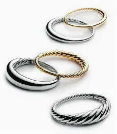  ??  ?? New gold and silver bracelets from the Pure Form collection.