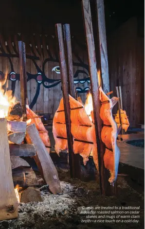  ??  ?? Guests are treated to a traditiona­l alder-fire roasted salmon on cedar stakes and mugs of warm clam broth—a nice touch on a cold day.