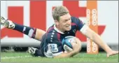  ?? Getty Images ?? FINAL NAIL: Bryce Hegarty scores the match-winning try for the Rebels yesterday.