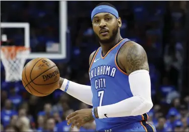  ?? ASSOCIATED PRESS FILE PHOTO ?? Oklahoma City Thunder’s Carmelo Anthony looks to pass during a 2018playof­f game. Anthony, who also won three Olympic gold medals and an NCAA Championsh­ip at Syracuse, has announced his retirement after 19NBA seasons.