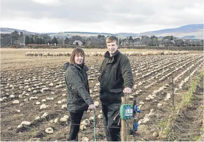  ??  ?? Kirsten Williams, beef and sheep consultant with SAC Consulting, and vet Andrew Littlejohn, from Kirkton Veterinary Centre.