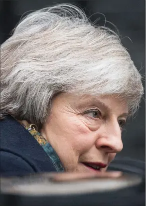  ??  ?? „ Theresa May leaves 10 Downing Street for the Commons to make her Brexit statement.