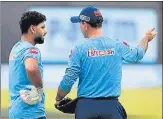  ??  ?? DC coach Ricky Ponting talks to his skipper Rishabh Pant.