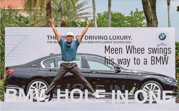  ?? PIC BY AIZUDDIN SAAD ?? Kim Meen Whee of South Korea celebrates after his hole-in-one on the 15th won him a BMW 740 LE in the third round of the CIMB Classic yesterday.